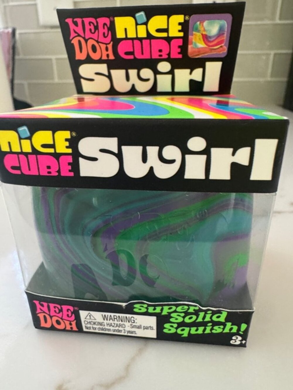NeeDoh Nice Cube Swirl Super Solid Squish! Kids Toy - Green, Purple & Blue Swirl